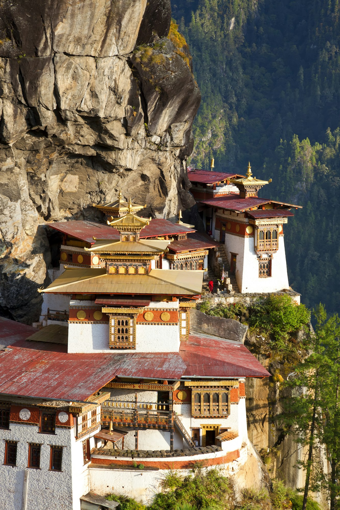 Himalayan Buddhist sacred site, temple complex perched on a ledge on a cliff